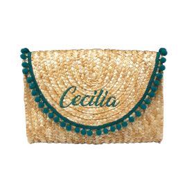 Pochette in paglia con pompon smeraldo